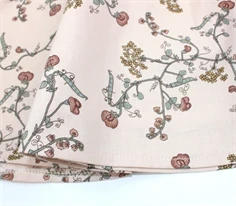 En Fant nederdel shell med blomster